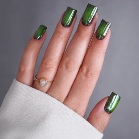 Medium-length dark green nails