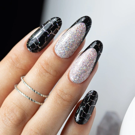 Reverse French tips with sparkling accents