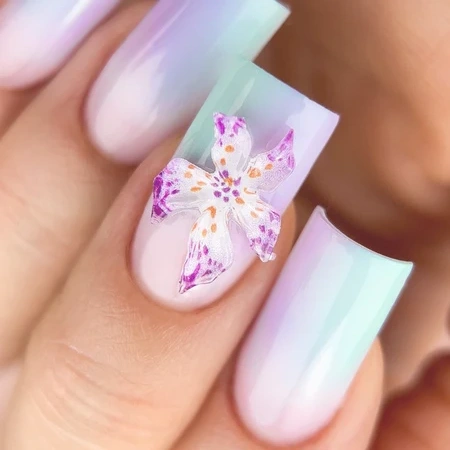 Multi-coloured ombré nails with a 3D flower