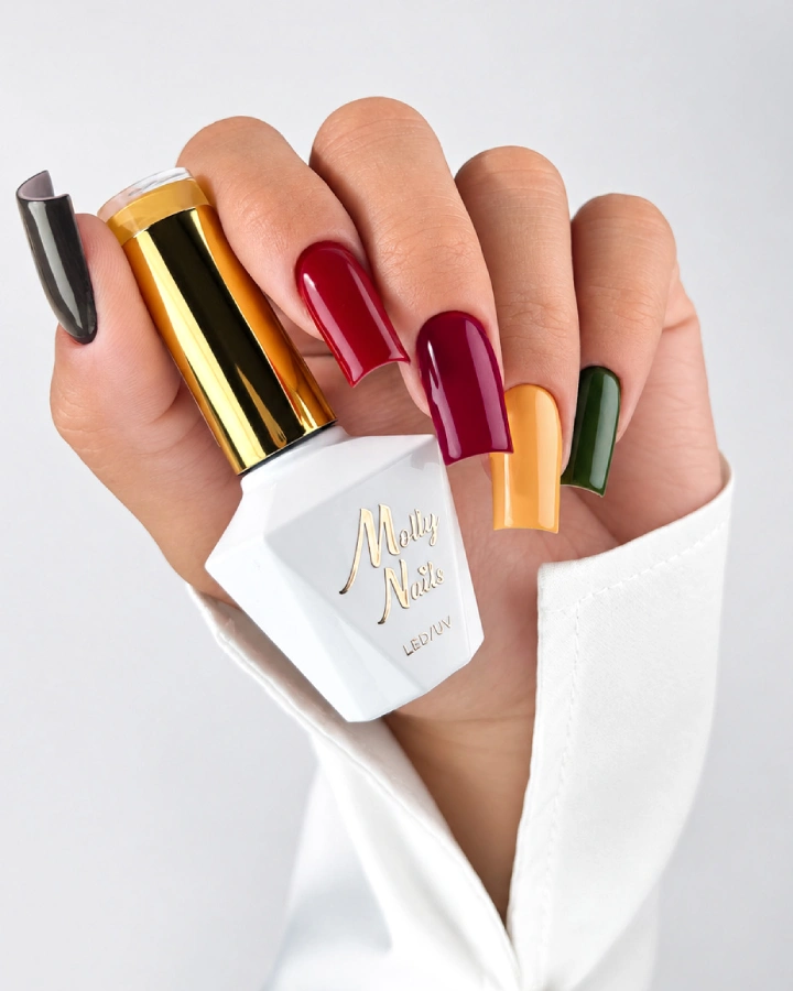 The Trend Edit MollyNails manicure in burgundy, red, mustard, green and steel grey shades