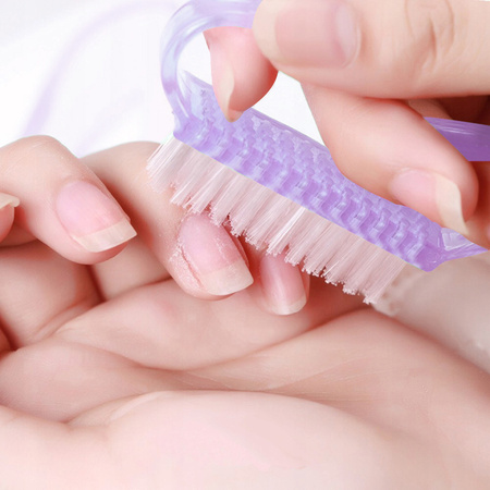 Small purple manicure and dust brush