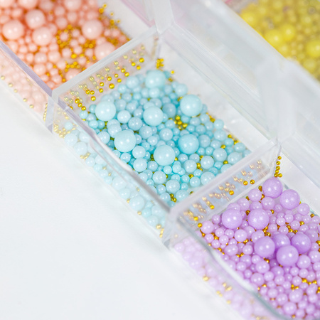 Colorful pearl beads for nail art in a case