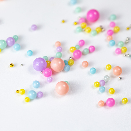 Colorful pearl beads for nail art in a case